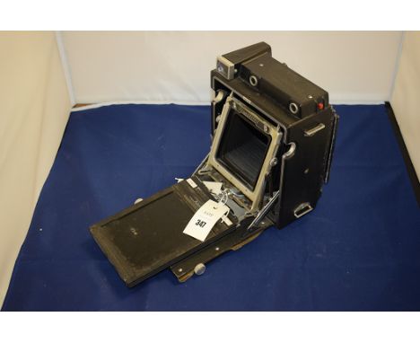 A Crown Graphlex American plate camera, no. 907296.