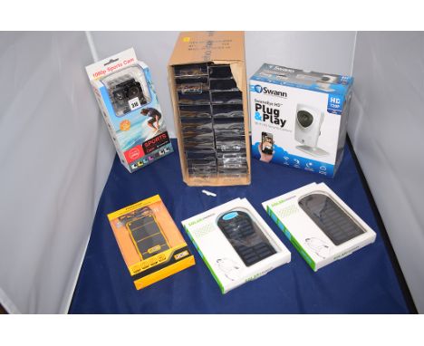 A Swann Advance Security HD plug-n-play wi-fi security camera; two solar charges; a JCB power bank; a quantity of stereo earp