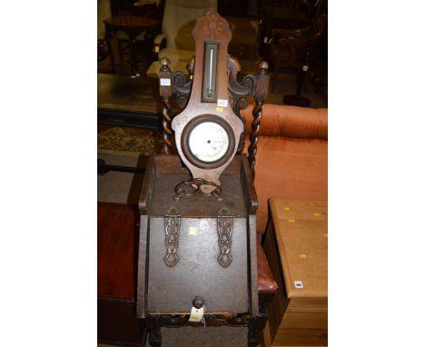 An early 20th Century stained oak coal box, copper mounts; together with an early 20th Century barometer by R. McQueen & Sons