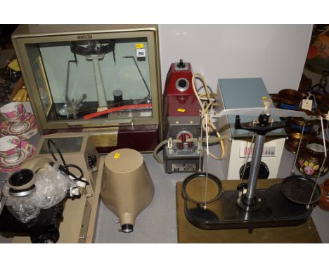 An Oertling laboratory balance; a Vickers microscope; a Watson-Marlow Ltd. HR flow inducer; various other scales and instrume