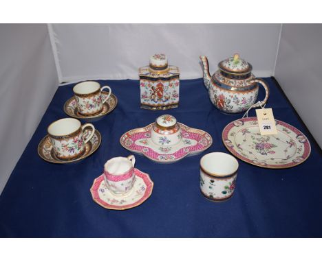 Samson style teapot; tea caddy; coffee cans and saucers; and a circular pot (cover missing); and four other pieces in a diffe