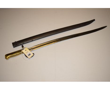 A late 19th Century bayonet for a Chassepot bayonet, with ribbed brass grip and steel scabbard.