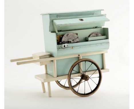 An early 20th Century musical barrow, the blue painted piano-shaped case fitted clockwork musical movement (many teeth to com