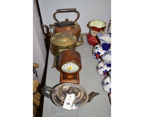 An Edwardian inlaid mahogany mantel clock; a copper kettle; a brass spirit kettle; and a silver plated teapot by Walker & Hal