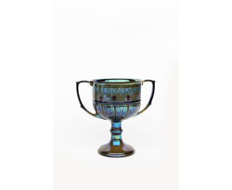 A Pilkington's Lancastrian Pottery twin-handled coupe by Gordon Forsyth, dated 1908-09, painted with bands of stylised carnat