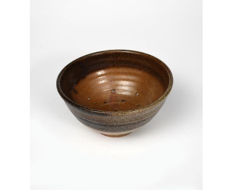 Richard Batterham (1936-2021) a small salt-glaze stoneware colander, unsigned 19.5cm. diam. Provenance From the estate of Ric