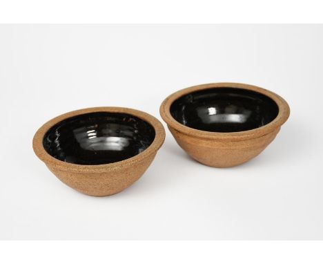 Richard Batterham (1936-2021) two small stoneware mixing bowls, glazed to the interior black iron unsigned 16cm. diam. (2) Pr