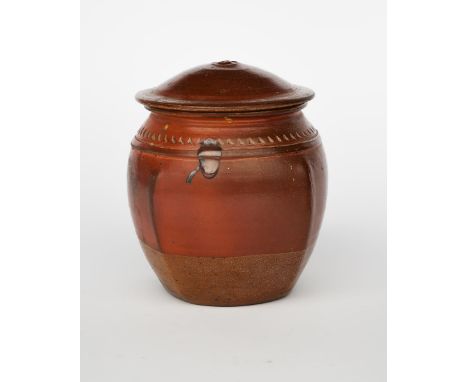 Richard Batterham (1936-2021) a stoneware beaten caddy and cover, with chattering band to shoulder, covered with a red salt-g