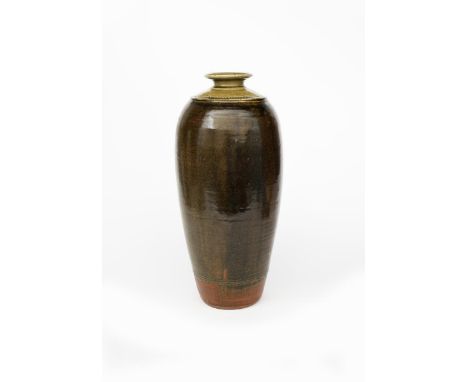 Richard Batterham (1936-2021) a stoneware two piece bottle with chattering band to the shoulder, covered to the foot in tenmo