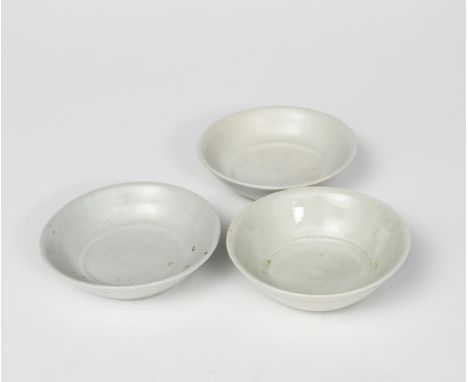 Richard Batterham (1936-2021) a porcelain avocado dish covered with a pale celadon glaze, and two other porcelain avocado dis