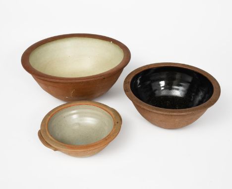 Richard Batterham (1936-2021) a stoneware mixing bowl, glazed to the interior with ash, another smaller glazed black iron to 