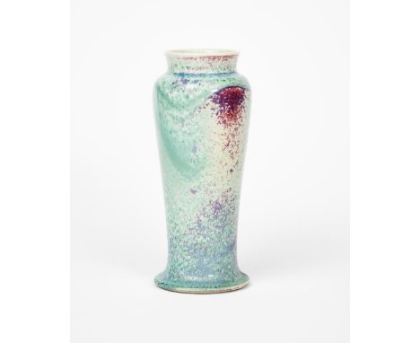 A Ruskin Pottery high-fired stoneware vase designed by William Howson-Taylor, dated 1907, tall, slender form with collar rim,