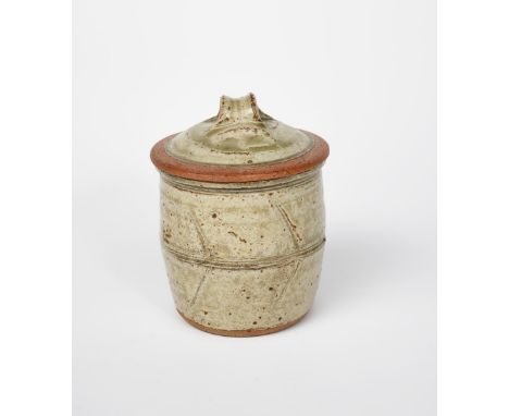 Richard Batterham (1936-2021) a stoneware jar and cover with cut herringbone design, covered to the foot in ash glaze, unsign