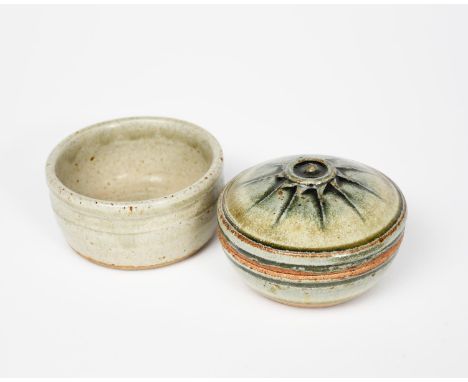 Richard Batterham (1936-2021) a stoneware box and cover, circular with sun motif, covered in an ash glaze, and a stoneware eg
