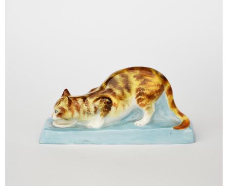 Stella Crofts (1898-1964) Cat Eating a Royal Worcester figure, model no.2897, glazed in colours printed factory mark, painted