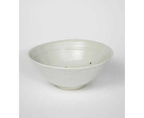 Richard Batterham (1936-2021) a large porcelain bowl with chattering band to well, covered in a pale celadon glaze unsigned 2