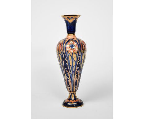 'Alhambra' a James Macintyre and Co vase designed by William Moorcroft, slender, baluster form on foot, tubeline decorated wi