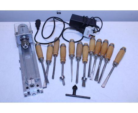 A selection of woodworking tools and a miniature lathe 