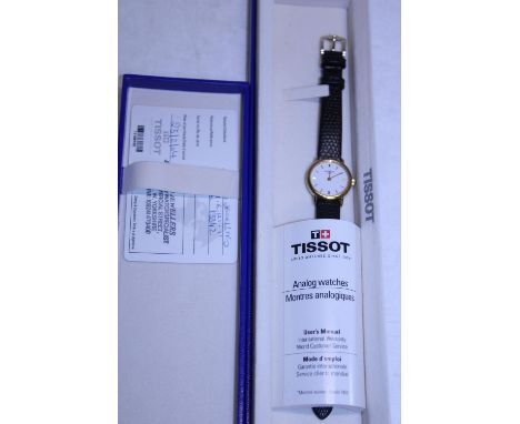 A boxed Tissot watch 