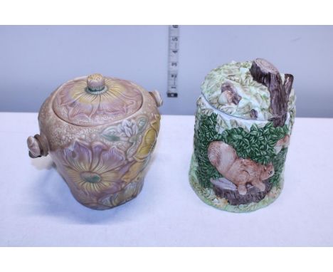 Two vintage biscuit barrels. 