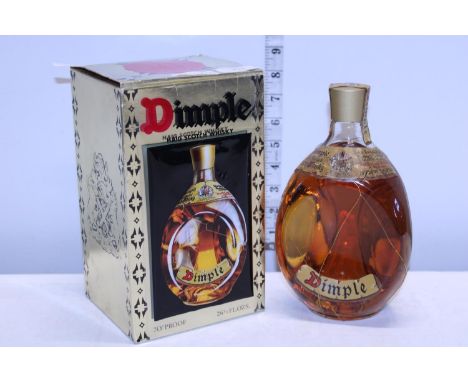 A boxed Dimple scotch whisky 