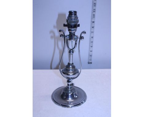 A vintage chrome wall mounted gimbal light 