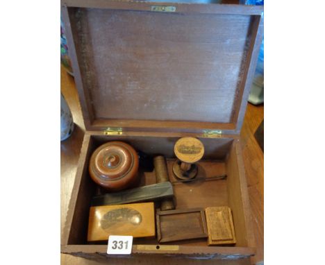 Two Mauchline ware items including egg timer and other Treen boxes etc, inside a Black Forest style carved chest shaped box