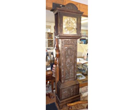 19th century Grandfather clock in carved oak case with 13" square brass dial, silvered chapter ring and second sweep, the eig