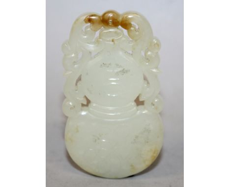 A CHINESE PIERCED CELADON JADE PENDANT, in the form of a gourd and scrolling stems, 2.4in high.
