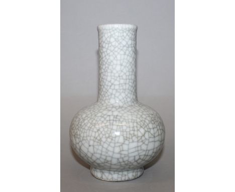 A CHINESE CRACKLEGLAZE PORCELAIN VASE, the squat ovoid body rising to a cylindrical neck, the base with a Qianlong seal mark,