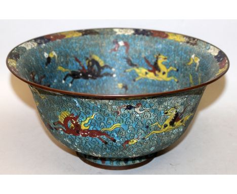 AN ORIENTAL MING STYLE CLOISONNE BOWL, the interior and exterior sides decorated with flame-winged horses above stylised wave