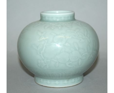 A GOOD QUALITY CHINESE CELADON PORCELAIN VASE, the globular ovoid body decorated beneath the glaze with arrangements of peach