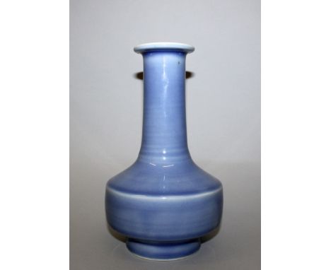 A CHINESE CLAIRE-DE-LUNE PORCELAIN VASE, the squat mallet-form body rising to a long slightly tapering neck, the base with a 