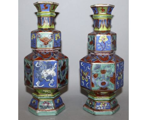 A GOOD PAIR OF EARLY 18TH CENTURY CHINESE KANGXI PERIOD CLOBBERED PORCELAIN VASES, of hexagonal section and double gourd form