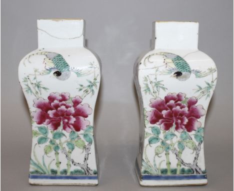 A PAIR OF 19TH CENTURY CHINESE FAMILLE ROSE PORCELAIN VASES, each rectangular section body painted with a bird in flight abov