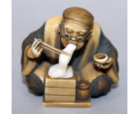 ANOTHER GOOD QUALITY EARLY 20TH CENTURY SIGNED JAPANESE STAINED IVORY NETSUKE, carved in the form of a seated man eating nood