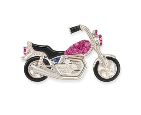 PAOLO PIOVAN, A RUBY, DIAMOND AND ONYX MOTORBIKE BROOCH the body set with calibre cut rubies and sapphires, round cut diamond