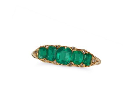 AN ANTIQUE EMERALD AND DIAMOND RING in 18ct yellow gold, set with a row of five cushion cut emeralds accented by rose cut dia