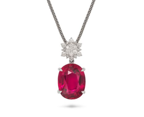 A PINK TOURMALINE AND DIAMOND PENDANT NECKLACE the pendant set with a cluster of round brilliant cut diamonds suspending an o