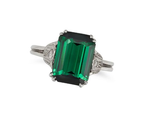A GREEN TOURMALINE AND DIAMOND RING set with an octagonal step cut green tourmaline of approximately 3.00 carats, the shoulde