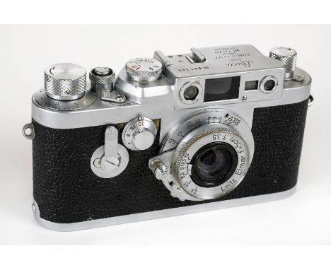 * Leica IIIg rangefinder (1957) with Elmar 50mm f/3.5 lens. Leica IIIg chrome rangefinder camera, Serial Number 891149, manuf