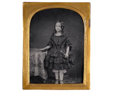 * Hampshire ambrotype. Portrait of a young girl in a pretty frock, 1850s, quarter-plate ambrotype of a young girl standing ne