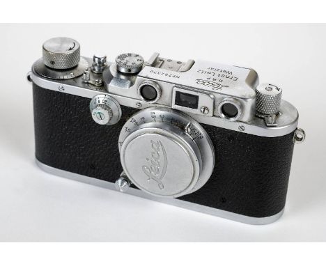 * Leica IIIb rangefinder (1938) with Elmar 50mm f/3.5 lens. Leica IIIb chrome rangefinder camera, Serial Number 282370, manuf