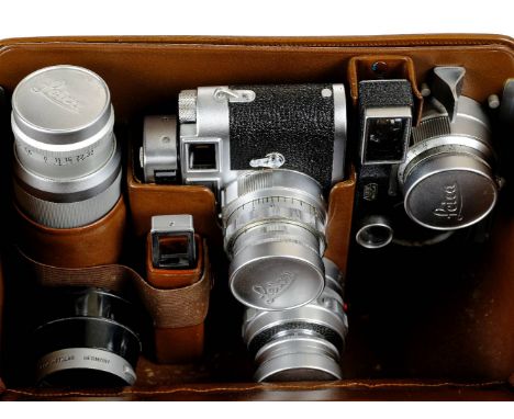 * Leica M3 rangefinder with 35mm, 50mm, 90mm and 135mm lenses. Leica M3 chrome rangefinder camera, Serial Number 900250, exce