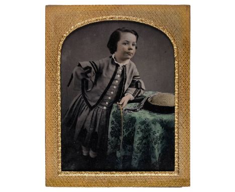 * Hampshire ambrotype. Portrait of a young boy, 1850s, tinted half-plate ambrotype of a young boy in a dress coat leaning on 