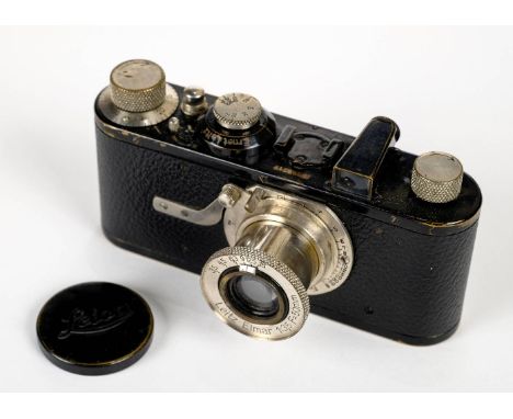 * Leica I camera (1930) with fixed Elmar 50mm f/3.5 lens. Leica I camera, Serial Number 46517, made in Germany in 1930, good 