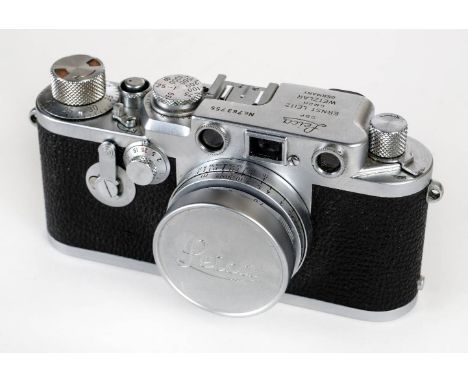 * Leica IIf rangefinder (1955) with Elmar 50mm f/2.8 lens. Leica IIf chrome rangefinder camera, Serial Number 763755, manufac