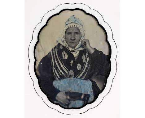 * Russian Ethnic Woman. Half-length portrait of a seated woman in traditional costume, circa 1850, quarter-plate daguerreotyp