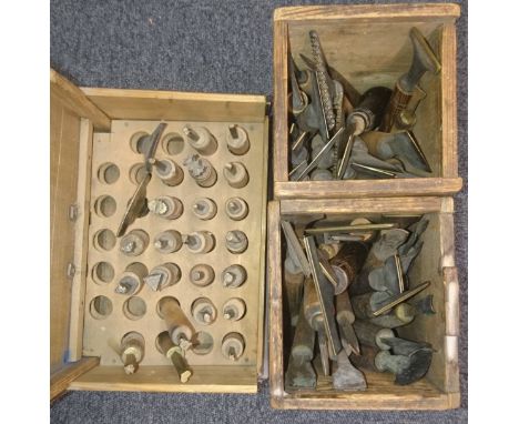 * Decorative finishing tools. 22 decorative brass finishing tools, mostly centre &amp; detail tools of traditional design, ma