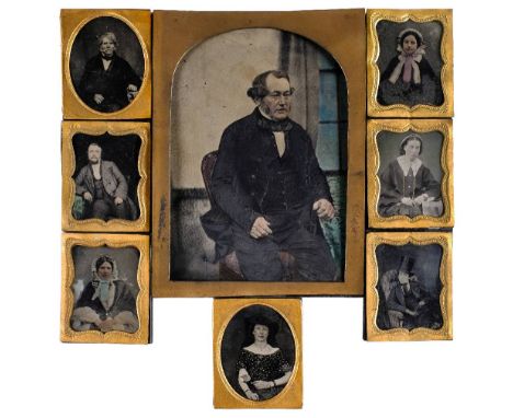 * Hampshire ambrotypes. Portrait of a seated middle-aged man, 1850s, tinted half-plate ambrotype, original elliptical brass m